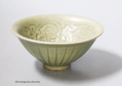 A Chinese carved celadon bowl, diameter 12cm