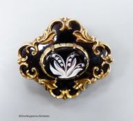 A Victorian yellow metal and two colour enamel cartouche shaped mourning brooch, with engraved