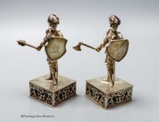 A pair of late 19th/early 20th century Hanau? white metal miniature model knights, on pieced square