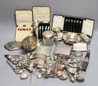 Assorted small silver including cased sets of cocktail sticks, sauceboat, toilet jars, cigarette