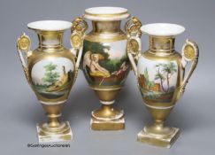 A 19th century French porcelain garniture of three vases, height 27cm