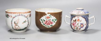 An 18th century Chinese export jar, lacking cover, a similar two handled jar and cover and a brown