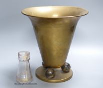 A Hoffman style brass vase and a small secessionist style glass vase, 24cm tall