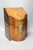A George III serpentine mahogany veneered knife box, height 35cm