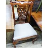 A pair of George II mahogany dining chairs