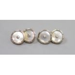 A pair of 18ct, mother of pearl and diamond set disc cufflinks,14mm, gross 7.7 grams.