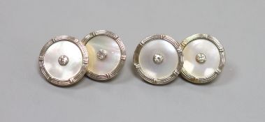 A pair of 18ct, mother of pearl and diamond set disc cufflinks,14mm, gross 7.7 grams.
