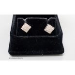 A modern pair of 18ct white gold and diamond encrusted square ear studs, 5mm, gross weight 2.7