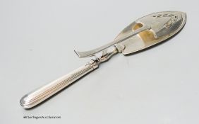 A pair of George III silver navette shaped serving tongs, Peter, Ann & William Bateman, London