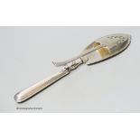 A pair of George III silver navette shaped serving tongs, Peter, Ann & William Bateman, London