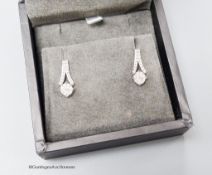 A modern pair of Rox 18ct white gold and shaped diamonds cluster set earrings, 16mm, gross weight