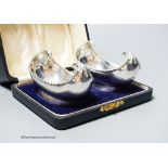 A cased pair of George V silver boat shaped bonbon dishes, S. Blanckensee & Son Ltd, Chester, 1927,