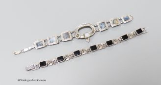A 925 white metal and agate set bracelet, 19cm and a white metal, black onyx and marcasite set