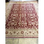 A Zeigler style burgundy ground carpet, 315 x 246cm