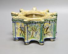 A 19th century Italian maiolica flower holder, of stellar form, 19cm diameter