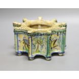 A 19th century Italian maiolica flower holder, of stellar form, 19cm diameter