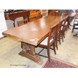 An 18th century style rectangular oak refectory dining table, width 230cm, depth 85cm, height 77cm