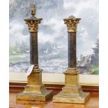 A pair of faux ormolu corinthian column table lamps, height 43cm