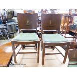 A set of four 1920's chinoiserie lacquer dining chairs