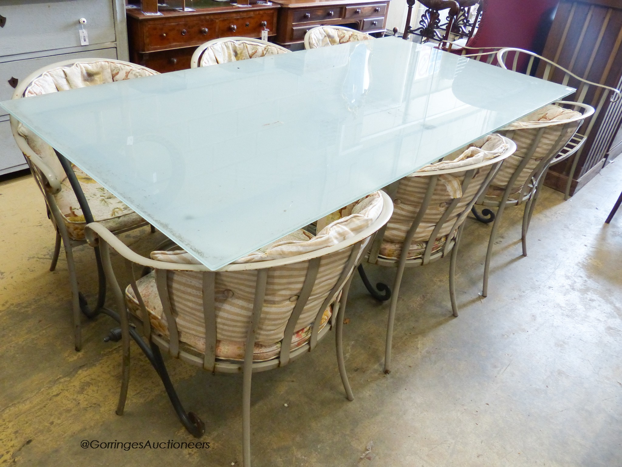 A rectangular glass topped wrought iron garden table and eight chairs. Table, 200x100x75cm. - Image 3 of 3