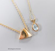 A 14ct gold triangular pendant on 14ct gold chain, gross 5.7 grams, an aquamarine pendant on 9ct