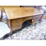 An Edwardian satinwood banded mahogany kneehole dressing table, width 122cm, depth 58cm, height