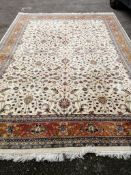 An Isphahan ivory ground carpet, 420 x 302cm