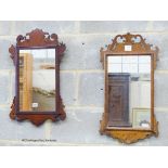 Two George III style walnut fret cut wall mirrors, largest W.37cm. H.67cm