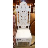 A 17th century style white painted side chair
