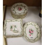 A quantity of 19th century hand painted floral plates, decorated with roses set within trailing