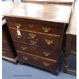 An 18th century East Anglian oak chest,fitted with an arrangement of three long drawers and four