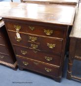 An 18th century East Anglian oak chest,fitted with an arrangement of three long drawers and four