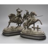 A pair of spelter figures on horseback