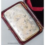 A Victorian silver mounted purse, with engraved aesthetic decoration, R.W & Co, Birmingham, 1884,