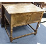 A 17th century and later oak chest on stand, width 97cm, depth 64cm, height 85cm