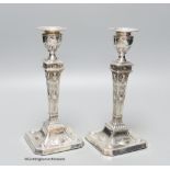 A pair of late Victorian Adams design silver candlesticks, Sheffield, 1898, 20cm, weighted.