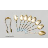 A set of eight Norwegian white metal and enamel coffee spoons and sugar tongs, by Marius Hammer,