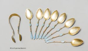 A set of eight Norwegian white metal and enamel coffee spoons and sugar tongs, by Marius Hammer,