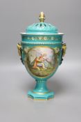 A 19th century French porcelain pot pourri vase, turquoise green ground with a pierced cover,