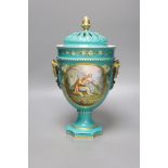 A 19th century French porcelain pot pourri vase, turquoise green ground with a pierced cover,