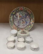 Seven 18th century English porcelain tea bowls, an armorial box and cover and a famille rose dish,