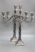 A pair of Georgian style plated two-branch three-light candelabra, height 53cm