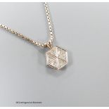 A white metal and six stone triangular diamond set hexagonal pendant, 9mm, pendant on an Italian