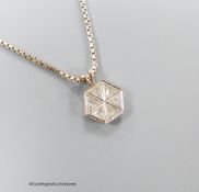 A white metal and six stone triangular diamond set hexagonal pendant, 9mm, pendant on an Italian