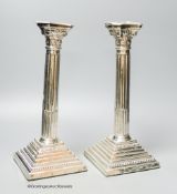 A pair of 1960's silver Corinthian column candlesticks, D J Silver Repairs, London, 1967, 30cm,