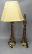 A pair of rouge marble and gilt metal corinthian column table lamps
