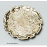 A George II silver salver with later embossed decoration, Robert Abercrombie, London, circa 1730,
