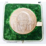 A cased RMS Queen Mary maiden voyage 1936 bronze medal designed by Gilbert Bayes
