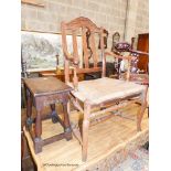 An early 18th century oak rectangular topped stool and an oak lathe back elbow chair (2)