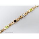 A modern 9ct gold and multi gem set bracelet, 18.4cm, gross weight 15.5 grams.